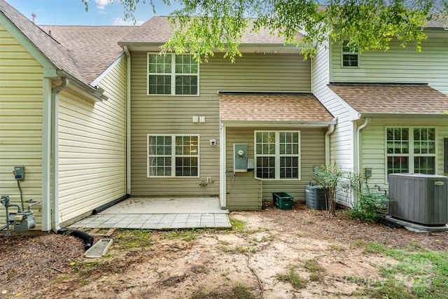 10421 Columbia Crest Ct, Charlotte, NC 28270 - rear view of property featuring a patio area and roof with shingles