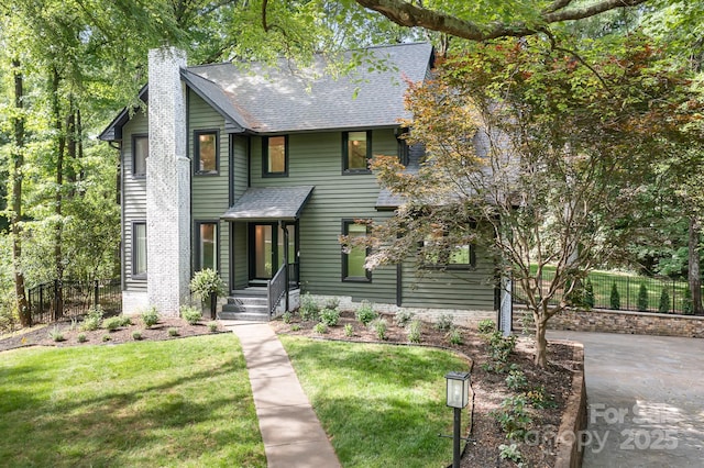 4316 Old Saybrook Ct, Charlotte, NC 28211 - view of front facade with a chimney and a shingled roof