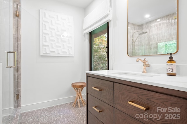 4316 Old Saybrook Ct, Charlotte, NC 28211 - bathroom with tiled shower, vanity, and baseboards