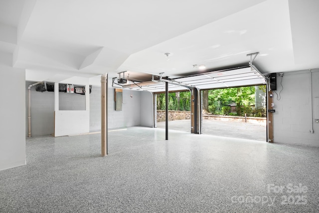 4316 Old Saybrook Ct, Charlotte, NC 28211 - garage featuring a garage door opener and concrete block wall