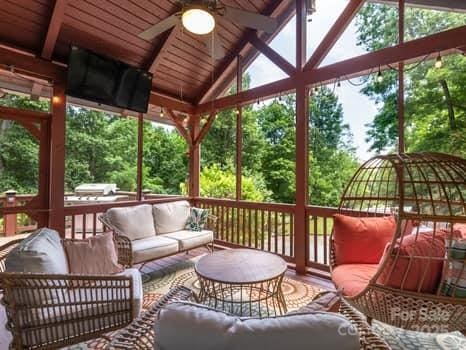 55 Christine Ct, Waynesville, NC 28786 - sunroom featuring a ceiling fan, an outdoor living space, and plenty of natural light
