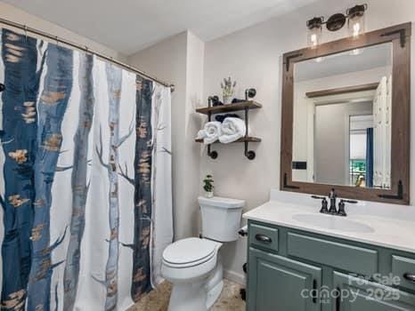 55 Christine Ct, Waynesville, NC 28786 - bathroom featuring vanity and curtained shower