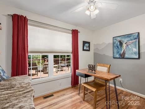 55 Christine Ct, Waynesville, NC 28786 - dining area featuring wood finished floors and a ceiling fan
