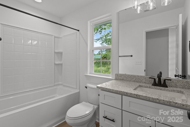 518 Herms Ave, Mount Holly, NC 28120 - bathroom with vanity, healthy amount of natural light, bathing tub / shower combination, and toilet