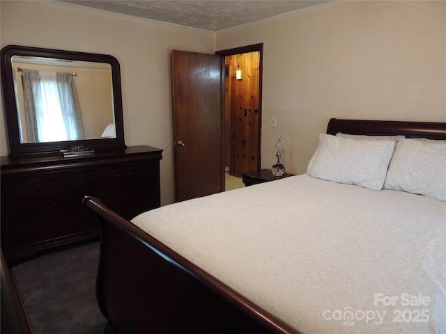 bedroom with ornamental molding