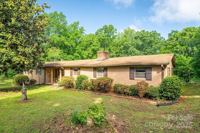 2871 Loviee Rd, Lincolnton, NC 28092 - single story home with a chimney, a front yard, and brick siding