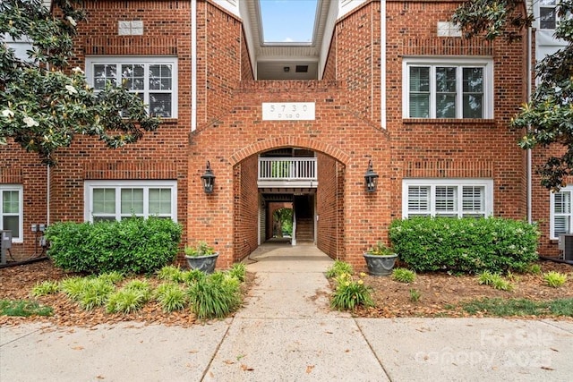 5730 Closeburn Rd Unit H, Charlotte, NC 28210 - view of front facade featuring brick siding and central air condition unit