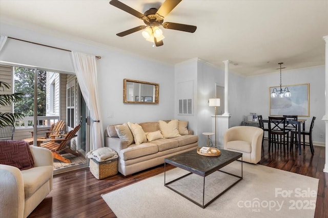 5730 Closeburn Rd Unit H, Charlotte, NC 28210 - living area featuring wood finished floors, a ceiling fan, ornamental molding, a chandelier, and ornate columns