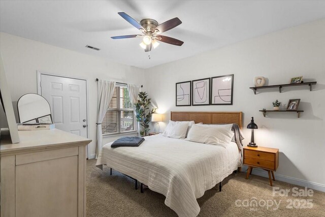 5730 Closeburn Rd Unit H, Charlotte, NC 28210 - bedroom with light colored carpet, baseboards, and ceiling fan