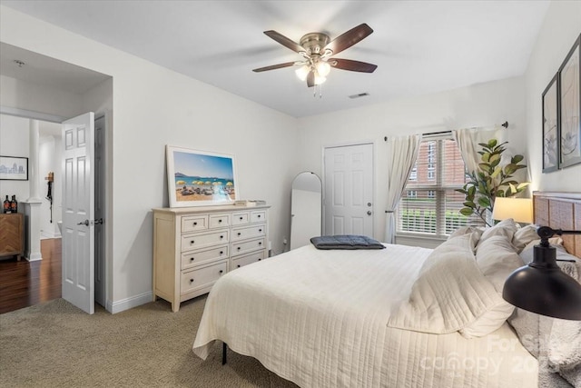 5730 Closeburn Rd Unit H, Charlotte, NC 28210 - bedroom with light colored carpet, baseboards, and a ceiling fan
