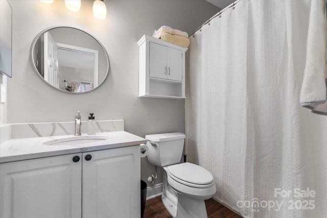 5730 Closeburn Rd Unit H, Charlotte, NC 28210 - bathroom with wood finished floors, toilet, and vanity