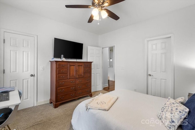 5730 Closeburn Rd Unit H, Charlotte, NC 28210 - bedroom featuring light carpet, baseboards, and ceiling fan