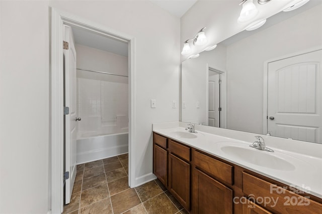 8505 Loxton Cir, Charlotte, NC 28214 - full bath featuring double vanity, shower / washtub combination, baseboards, and a sink