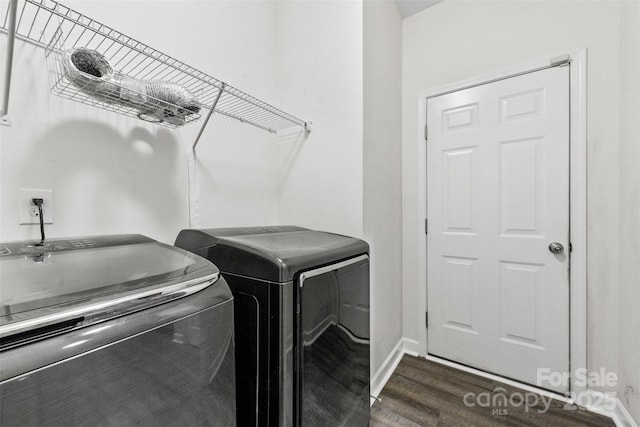 8505 Loxton Cir, Charlotte, NC 28214 - laundry area with washer and dryer, laundry area, dark wood finished floors, and baseboards