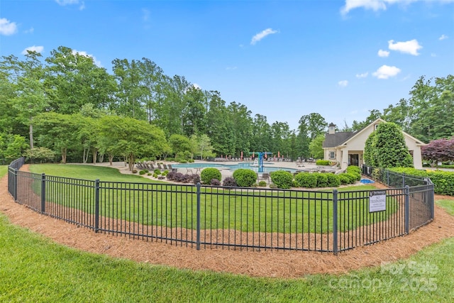 8505 Loxton Cir, Charlotte, NC 28214 - view of home's community with a yard, a swimming pool, and fence