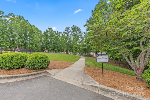 8505 Loxton Cir, Charlotte, NC 28214 - view of community with fence and a lawn
