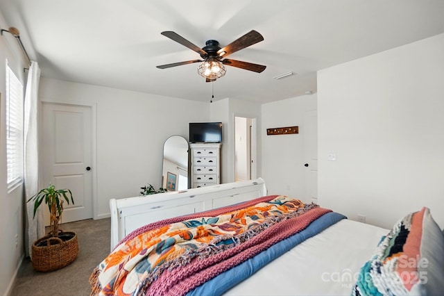 12021 Basking Dr, Charlotte, NC 28214 - bedroom with carpet floors, baseboards, and a ceiling fan