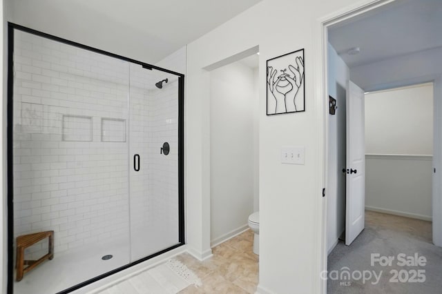 12021 Basking Dr, Charlotte, NC 28214 - full bath featuring a shower stall, toilet, and baseboards