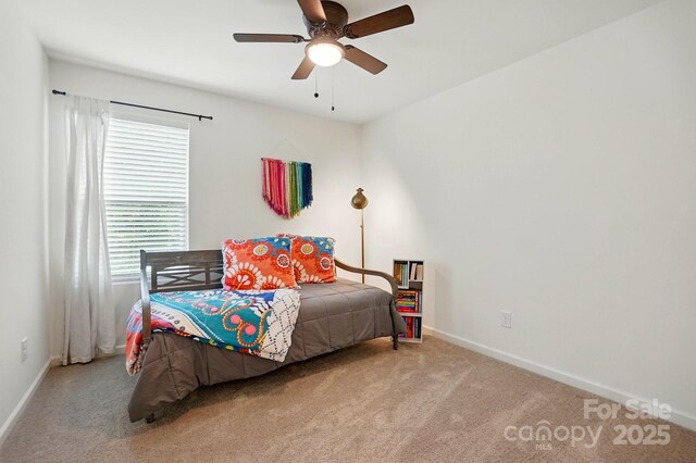 12021 Basking Dr, Charlotte, NC 28214 - bedroom featuring carpet flooring, baseboards, and a ceiling fan