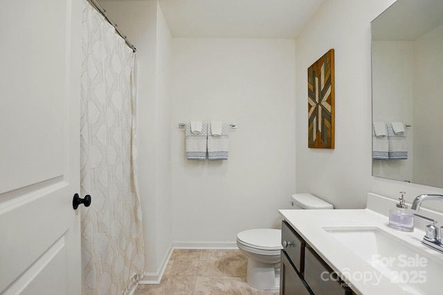 12021 Basking Dr, Charlotte, NC 28214 - bathroom featuring toilet, vanity, and curtained shower