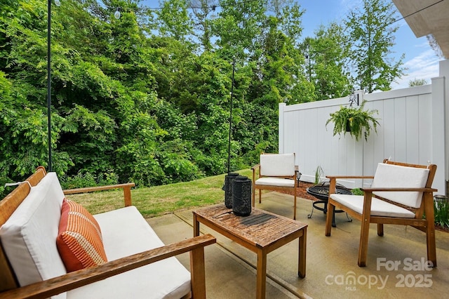 12021 Basking Dr, Charlotte, NC 28214 - view of patio / terrace featuring fence