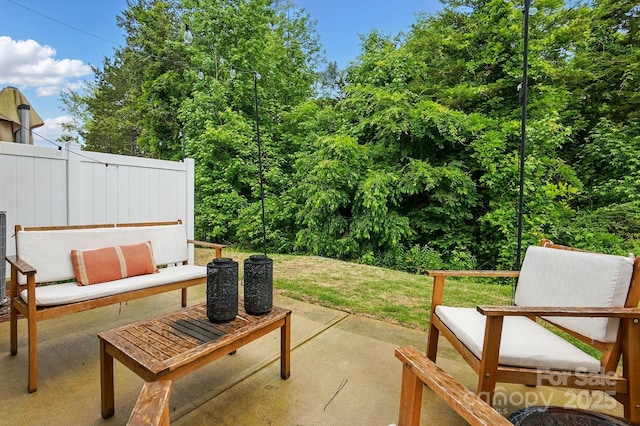 12021 Basking Dr, Charlotte, NC 28214 - view of patio / terrace featuring an outdoor living space