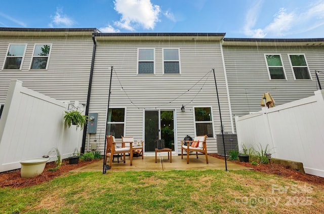 12021 Basking Dr, Charlotte, NC 28214 - rear view of house featuring a patio area
