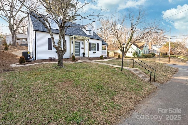 900 Gales Ave, Winston Salem, NC 27103 - cape cod-style house with central AC, a residential view, and a front lawn