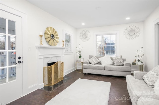 900 Gales Ave, Winston Salem, NC 27103 - living room with baseboards, dark wood-style flooring, a high end fireplace, and recessed lighting