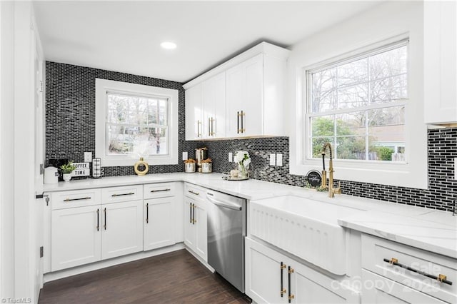 900 Gales Ave, Winston Salem, NC 27103 - kitchen featuring dishwasher, light stone counters, a sink, decorative backsplash, and white cabinets
