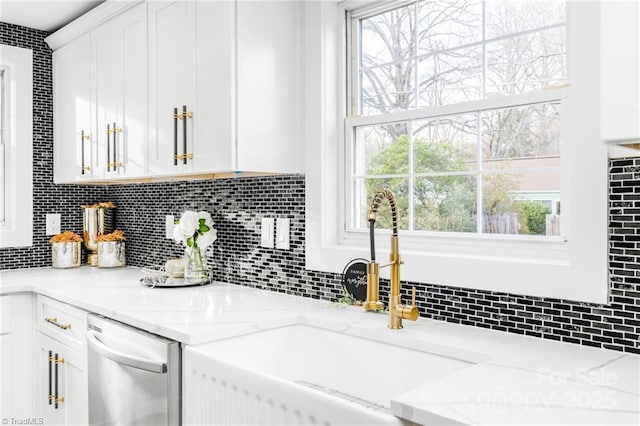 900 Gales Ave, Winston Salem, NC 27103 - kitchen featuring white cabinets, dishwasher, tasteful backsplash, and a sink