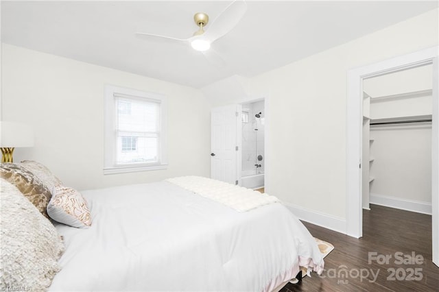 900 Gales Ave, Winston Salem, NC 27103 - bedroom featuring wood finished floors, a ceiling fan, a closet, baseboards, and a spacious closet