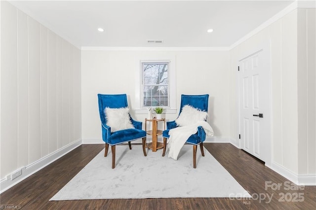 900 Gales Ave, Winston Salem, NC 27103 - living area with crown molding, baseboards, visible vents, and wood finished floors