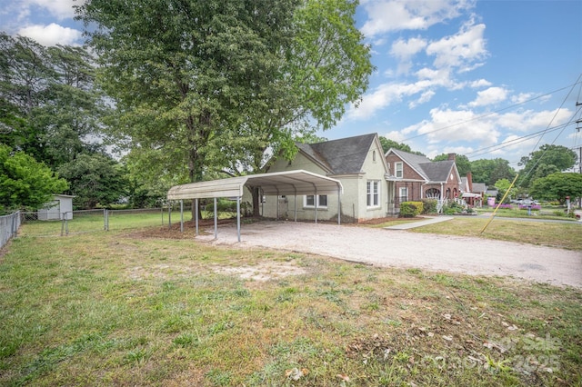 813 S Ridge Ave, Kannapolis, NC 28083 - view of home's exterior with dirt driveway and a detached carport