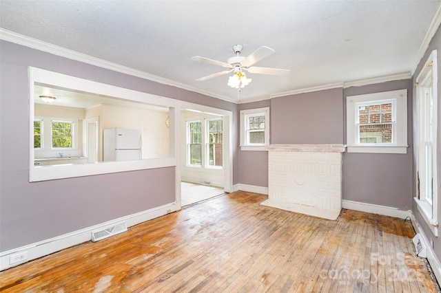 813 S Ridge Ave, Kannapolis, NC 28083 - spare room featuring baseboards, hardwood / wood-style floors, crown molding, and a ceiling fan