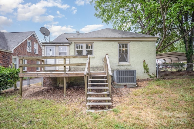 813 S Ridge Ave, Kannapolis, NC 28083 - rear view of property with cooling unit, a deck, stairs, a detached carport, and brick siding