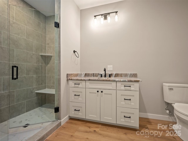 109 Ashley Ct, Mill Spring, NC 28756 - full bathroom with toilet, baseboards, a shower stall, and wood finished floors