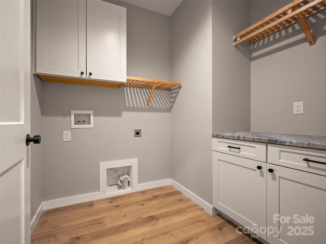 109 Ashley Ct, Mill Spring, NC 28756 - washroom featuring electric dryer hookup, cabinet space, hookup for a washing machine, baseboards, and light wood-style flooring