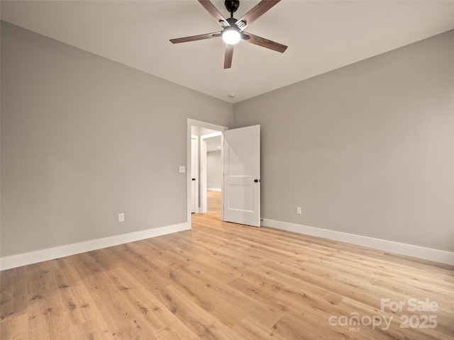 109 Ashley Ct, Mill Spring, NC 28756 - unfurnished bedroom with light wood-style flooring, baseboards, and a ceiling fan