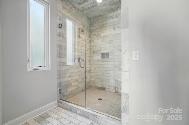 945 Westbrook Dr Unit A, Charlotte, NC 28202 - bathroom featuring a stall shower and baseboards