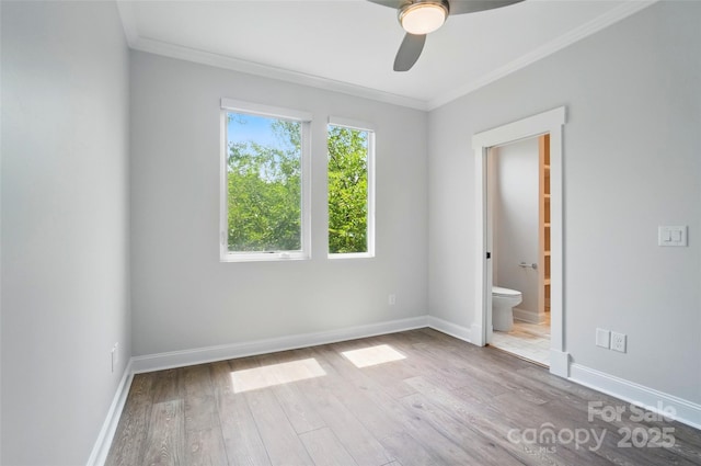 945 Westbrook Dr Unit A, Charlotte, NC 28202 - unfurnished bedroom with crown molding, wood finished floors, ensuite bath, and ceiling fan