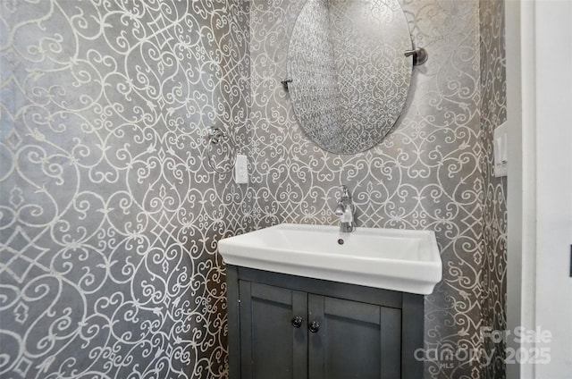 945 Westbrook Dr Unit A, Charlotte, NC 28202 - bathroom with vanity and wallpapered walls