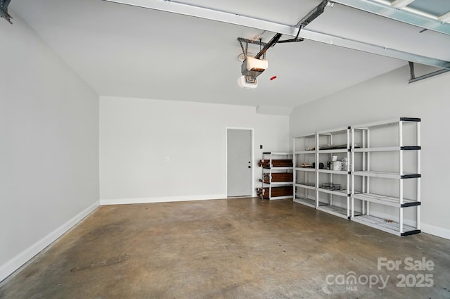 945 Westbrook Dr Unit A, Charlotte, NC 28202 - garage with a garage door opener and baseboards