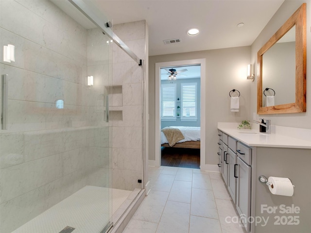 2401 Euclid Ave Unit 207, Charlotte, NC 28203 - bathroom featuring ceiling fan, a shower stall, vanity, recessed lighting, and ensuite bathroom