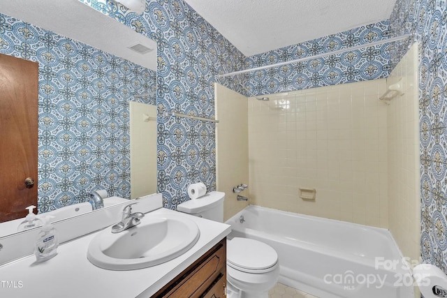 bathroom with shower / bathtub combination, wallpapered walls, a textured ceiling, toilet, and vanity