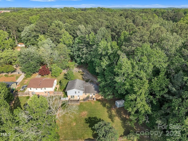 aerial view featuring a forest view