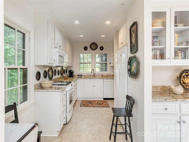 203 Lake Dr, Hendersonville, NC 28739 - kitchen featuring a sink, recessed lighting, white appliances, and white cabinets