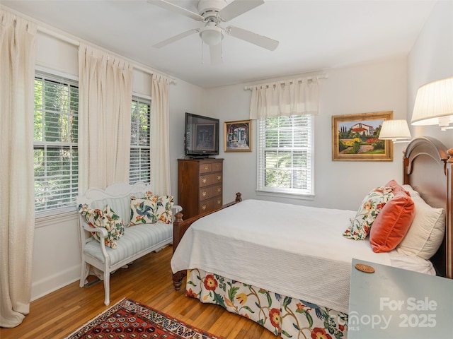 203 Lake Dr, Hendersonville, NC 28739 - bedroom with wood finished floors, baseboards, and ceiling fan