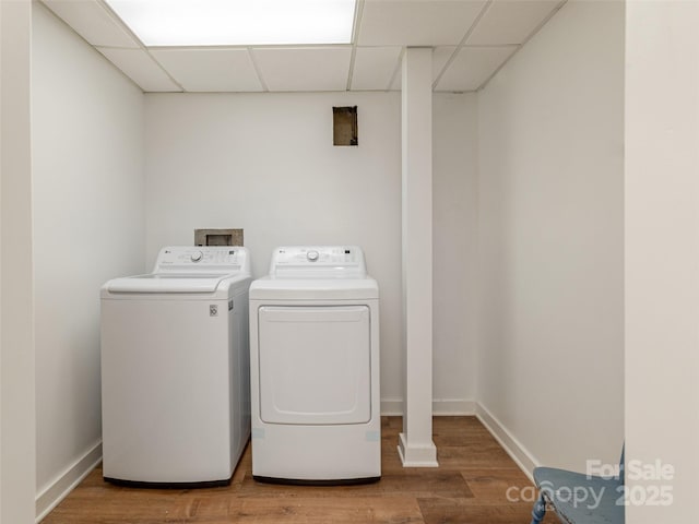 203 Lake Dr, Hendersonville, NC 28739 - laundry area featuring wood finished floors, baseboards, and washer and dryer