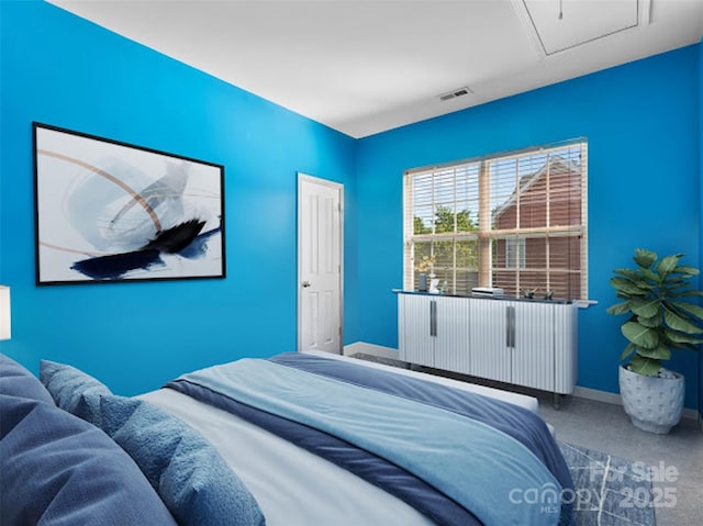 carpeted bedroom with baseboards